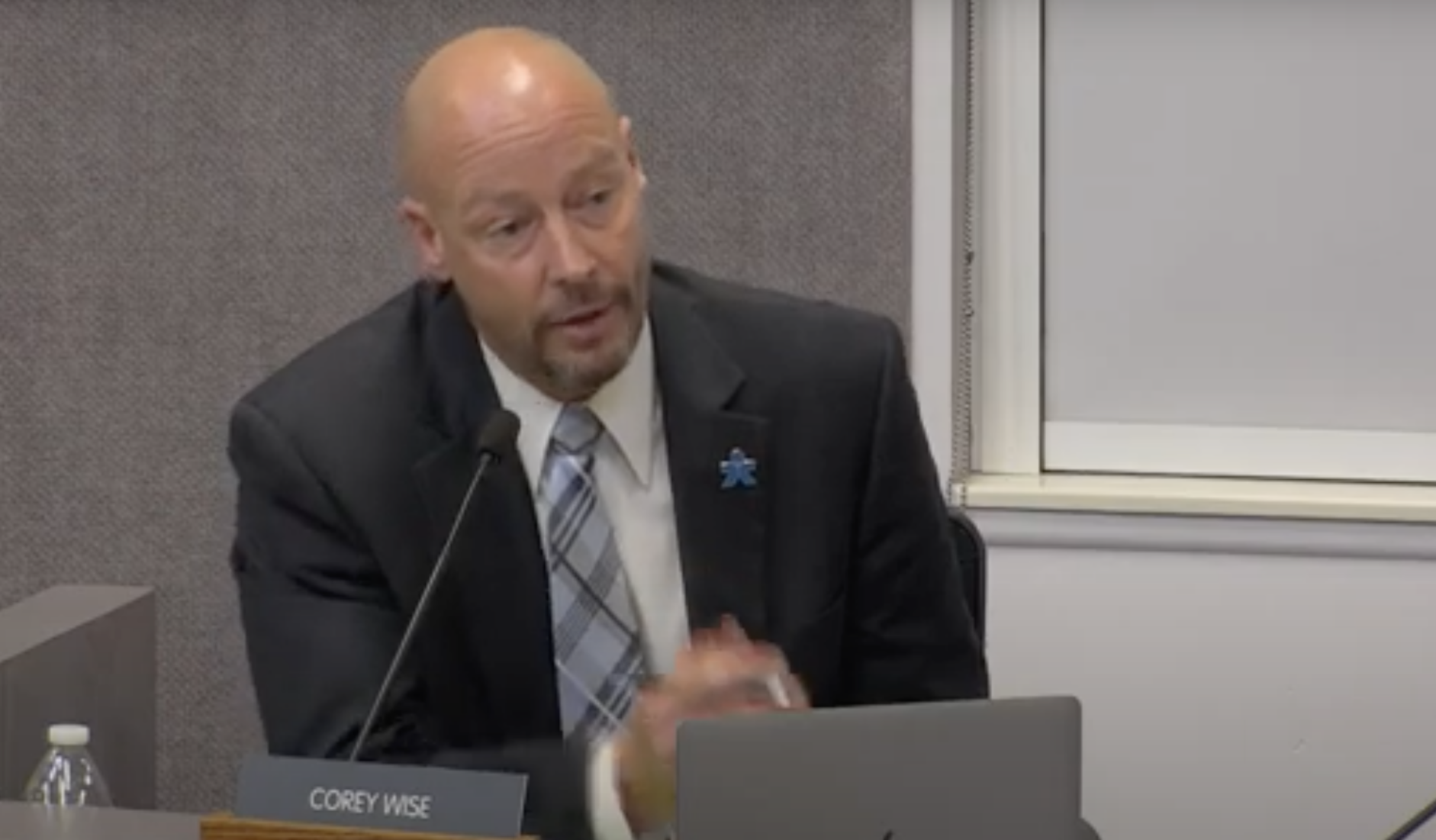 Corey Wise speaks during school board meeting